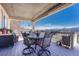 Covered patio with outdoor dining set and mountain views at 145 Kettle Valley Way, Monument, CO 80132