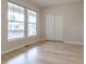 Bright bedroom with large windows and a closet at 5137 Mt Arapaho Cir, Frederick, CO 80504