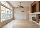 Sunlit living room boasting large windows and hardwood floors at 5137 Mt Arapaho Cir, Frederick, CO 80504