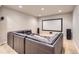 Home theater with large sectional, screen, and speakers at 9470 S Silent Hills Dr, Lone Tree, CO 80124