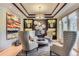 Stylish sitting area with coffered ceilings, unique decor, and comfortable seating at 9470 S Silent Hills Dr, Lone Tree, CO 80124