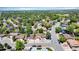Aerial view of a peaceful suburban neighborhood with tree-lined streets and well-maintained houses at 16941 E Eastman Pl, Aurora, CO 80013