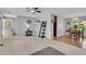 Open-concept living area boasts carpeted and hardwood floors next to the dining area at 16941 E Eastman Pl, Aurora, CO 80013