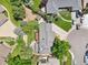This aerial view shows the property, landscaping, and surrounding neighborhood in an attractive setting at 11035 W 26Th Pl, Lakewood, CO 80215