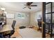 Home office featuring natural light, hardwood floors, and modern furnishings at 11035 W 26Th Pl, Lakewood, CO 80215