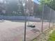 Outdoor basketball court surrounded by a chain link fence and trees on a sunny day at 4281 S Salida Way # 5, Aurora, CO 80013