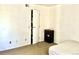 Clean, carpeted bedroom has closet with an open door, dresser, and light neutral paint at 4281 S Salida Way # 5, Aurora, CO 80013