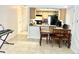 Kitchen featuring wooden cabinets, black appliances, and a dining area, great for cooking and entertaining at 4281 S Salida Way # 5, Aurora, CO 80013