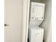 A dedicated laundry space with a stacked washer and dryer for convenient laundry tasks at 4281 S Salida Way # 5, Aurora, CO 80013