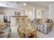 Finished basement featuring a bar, comfortable seating, and carpeted floors at 2935 Bow Line Pl, Longmont, CO 80503
