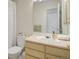 Traditional bathroom featuring a white sink and peach countertops at 2935 Bow Line Pl, Longmont, CO 80503
