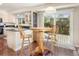 Eat-in kitchen with breakfast bar and sliding door to a private deck at 2935 Bow Line Pl, Longmont, CO 80503