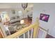Open-concept living room and dining room filled with natural light and hardwood floors at 2935 Bow Line Pl, Longmont, CO 80503