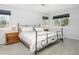 Tranquil main bedroom with neutral colors, ceiling fan, and ample natural light at 2935 Bow Line Pl, Longmont, CO 80503
