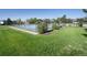Well-maintained community tennis court surrounded by lush green grass at 2935 Bow Line Pl, Longmont, CO 80503