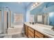 Beautiful bathroom with a large soaking tub, shower, and double vanity at 9306 W 13Th Pl, Lakewood, CO 80215