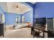 Spacious main bedroom boasts tray ceiling and adjacent office nook at 9306 W 13Th Pl, Lakewood, CO 80215