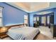 Beautiful main bedroom with tray ceiling, a work space, and carpeted floor at 9306 W 13Th Pl, Lakewood, CO 80215