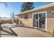 Deck with access to the home and a view of the backyard at 4070 W Dartmouth Ave, Denver, CO 80236