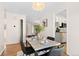 Dining area with marble table and modern chairs at 4070 W Dartmouth Ave, Denver, CO 80236