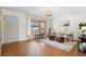 Bright living room with hardwood floors and bay window at 4070 W Dartmouth Ave, Denver, CO 80236