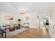 Living room featuring hardwood floors and stylish furniture at 4070 W Dartmouth Ave, Denver, CO 80236