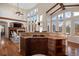 Modern kitchen featuring granite countertops, gas stove and large windows with lots of natural light at 6047 Vacquero Cir, Castle Pines, CO 80108