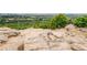 Scenic overlook featuring natural rock formations and lush foliage, showcasing beautiful valley views at 6047 Vacquero Cir, Castle Pines, CO 80108