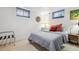 Basement bedroom with carpet and three windows at 1958 S Pearl St, Denver, CO 80210