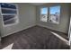Bedroom with large windows offering natural light at 490 Grey Rock St, Brighton, CO 80601