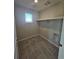 Bright laundry room features tile flooring and a utility sink hook up at 490 Grey Rock St, Brighton, CO 80601