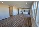 This open-concept home boasts lots of natural light and wood flooring, ideal for gatherings at 490 Grey Rock St, Brighton, CO 80601