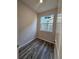 This room offers a sleek design with modern flooring and natural light, perfect for a productive workspace at 490 Grey Rock St, Brighton, CO 80601