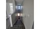Carpeted staircase with neutral wall color at 490 Grey Rock St, Brighton, CO 80601