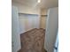 Spacious walk-in closet with carpet floors and metal clothing racks at 490 Grey Rock St, Brighton, CO 80601