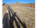 Picture of neighborhood walking path alongside a wooden fence, offering a scenic route for residents at 490 Grey Rock St, Brighton, CO 80601