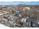 Aerial view of neighborhood featuring modern homes and tree-lined streets in an urban environment at 1260 Newton St # 1, Denver, CO 80204