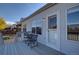 Cozy deck with outdoor seating, providing a great space for relaxation and enjoying the view of the surrounding neighborhood at 19563 E Ithaca Pl, Aurora, CO 80013