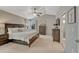 Serene main bedroom with a vaulted ceiling, generous natural light, and a door to the ensuite bath at 5819 W 82Nd Cir, Arvada, CO 80003