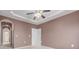 Spacious bedroom featuring neutral colored walls and carpet with two doorways at 7777 E 23Rd Ave # 1406, Denver, CO 80238