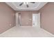 Spacious bedroom featuring neutral colored walls and carpet with two doorways at 7777 E 23Rd Ave # 1406, Denver, CO 80238