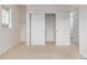 Bedroom featuring closet with sliding doors allowing easy access to storage space for clothing and accessories at 7777 E 23Rd Ave # 1406, Denver, CO 80238