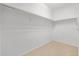 Spacious walk-in closet with ample shelving and storage space for an organized wardrobe at 7777 E 23Rd Ave # 1406, Denver, CO 80238