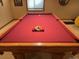 Detailed view of a classic pool table in a game room at 587 Brookside Dr, Longmont, CO 80504