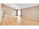 Bright and open living room with hardwood floors and a stylish chandelier at 5162 Hubert St, Parker, CO 80134