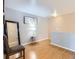 Second floor hallway features hardwood floors at 4520 Andes St, Denver, CO 80249