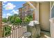 Balcony with beautiful views, a grill, and seating at 7812 Inverness Blvd, Englewood, CO 80112