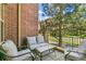 Comfortable patio with cushioned seating and views at 7812 Inverness Blvd, Englewood, CO 80112