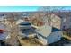 Aerial view showcasing a house with a detached garage and a large yard at 2881 W 65Th Ave, Denver, CO 80221