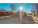 A large concrete patio offers an extension of outdoor living space with rear yard access at 2881 W 65Th Ave, Denver, CO 80221